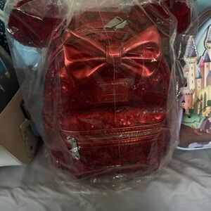 Loungefly Shimmering Red Sequin Backpack with Bow